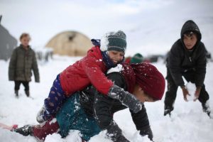 Syria-children-playing-in-snow-Afrin-OCHA