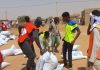 white UN aid bags-four men-Khartoum