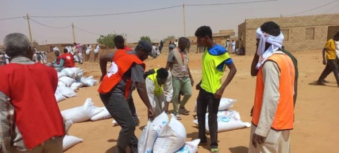 white UN aid bags-four men-Khartoum