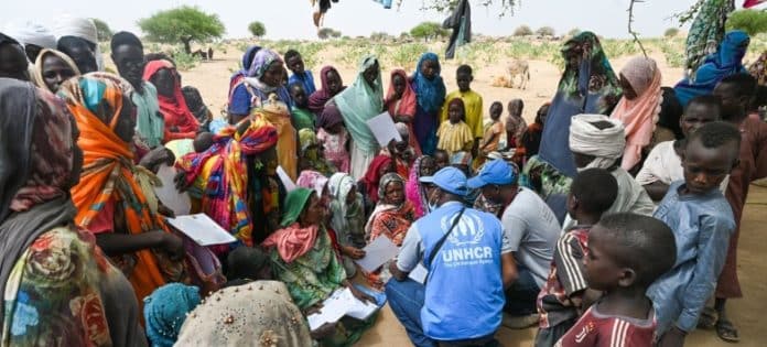unhcr personnel with locals