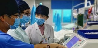 Doctors in the Department of Critical Care Medicine at Guangdong Medical University work in the intensive care unit where patients are being treated for COVID-19
