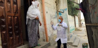 Health staff from the Shaboura Health Centre in Rafah, Gaza, run by UN relief agency UNRWA, deliver medications directly to elderly Palestine refugees in the wake of COVID-19, so reduce their chances of exposure.
