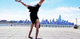 Jon Witt, a yoga teacher, practicing therapeutic yoga postures in Jersey City, USA.
