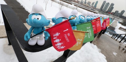 UNRIC Projects: Smurfs carrying SDG flags