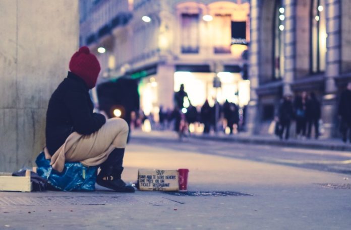 Homeless person | Photo © Ev via Unsplash