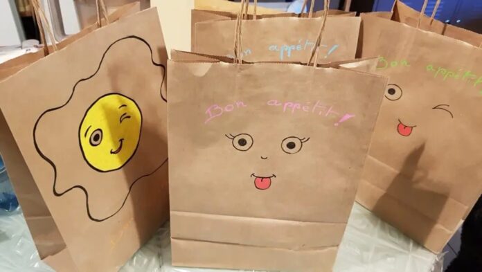Brown paper bags with drawings