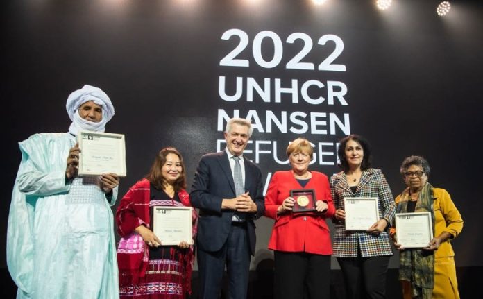 2022 Nansen Refugee Awards winners on stage