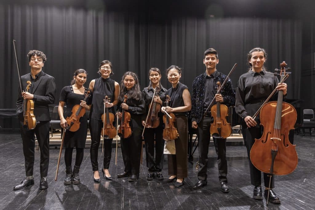 The UN Messenger of Peace, violinist Midori Goto with young students from the Conservatory and the Afghan Youth Orchestra