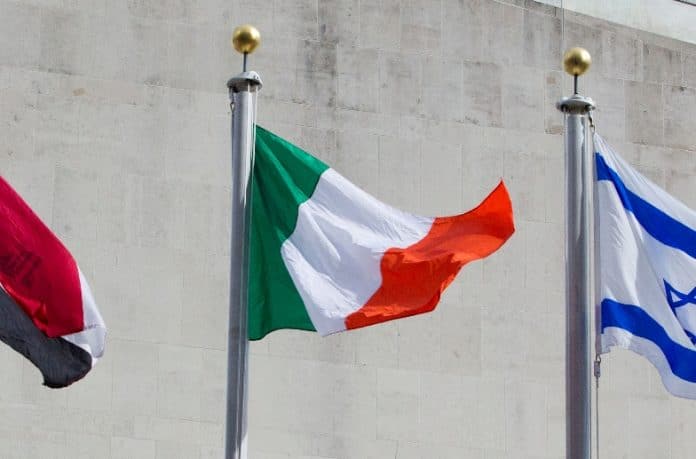 The flag of Ireland (centre) flying at United Nations headquarters in New York.