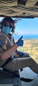 A woman on duty in a helicopter