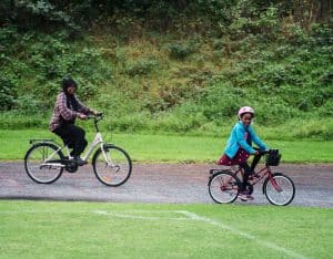 Refugees learning to bike in the bicycle loving Nordic countries.