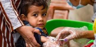vaccination d'un enfant syrien