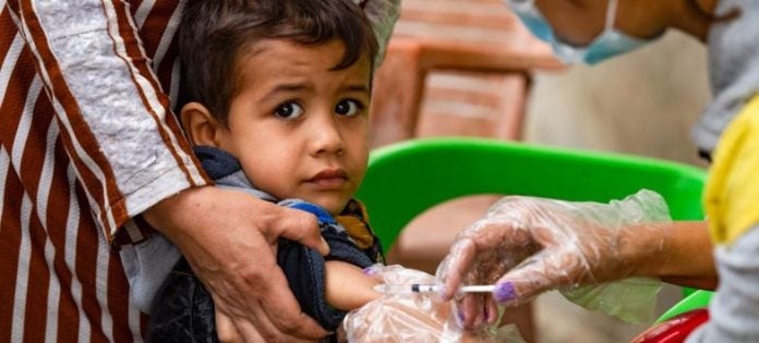 vaccination d'un enfant syrien