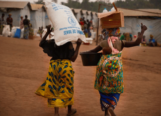 DRC: Displaced people at a distribution point in Ituri in April. Photo: Charlie Musoka