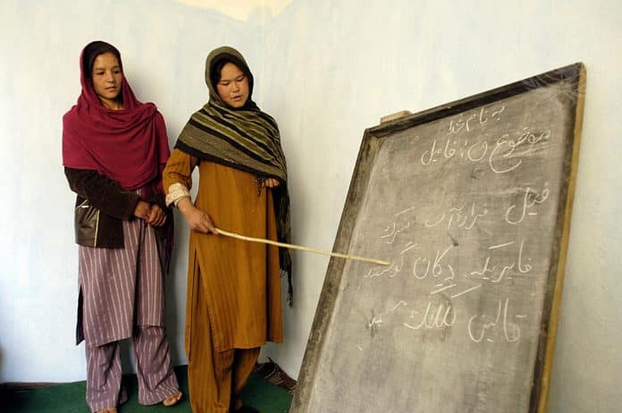 Afghan women attend literacy courses supported by the United Nations Children's Fund.