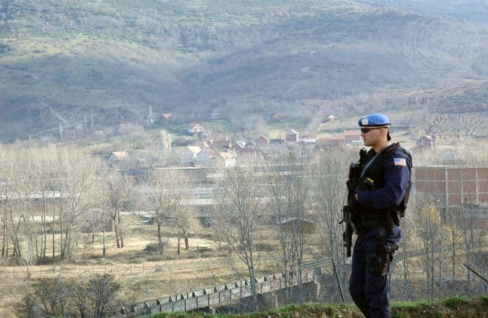 In this picture, a United Nations peacekeeping soldier on guard near Belgrade